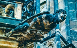 Czech architecture, scary gargoyle sculpture, gothic temple decoration. Medieval art, mystic gargoyle monster statue, St. Vitus C stock images Czech architecture, scary gargoyle sculpture, gothic temple decoration. Medieval art, mystic gargoyle monster statue, St. Vitus C stock images