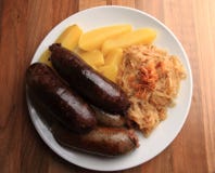 Czech food - black and white pudding and sauerkrau royalty free stock images Czech food - black and white pudding and sauerkrau royalty free stock images