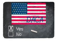 DACA концепция да используя мел на классн классном шифера стоковая фотография DACA концепция да используя мел на классн классном шифера стоковая фотография