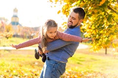 Dad and daughter in the autumn park play laughing royalty free stock photos Dad and daughter in the autumn park play laughing royalty free stock photos