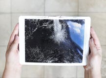 Damaged tablet computer lcd display on the floor Royalty Free Stock Photo Damaged tablet computer lcd display on the floor Royalty Free Stock Photo