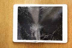 Damaged tablet computer lcd display on the floor Stock Images Damaged tablet computer lcd display on the floor Stock Images