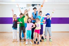 Dance teacher giving kids Zumba fitness class stock images Dance teacher giving kids Zumba fitness class stock images