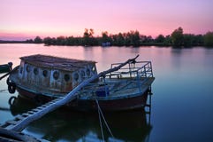 Danube River. Colored Sunset Landscape In Natural Reserve Of The Danube Delta - Landmark Attraction In Romania Stock Photos Danube River. Colored Sunset Landscape In Natural Reserve Of The Danube Delta - Landmark Attraction In Romania Stock Photos