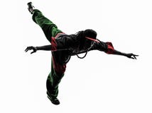 Dançarino acrobático da ruptura do hip-hop que breakdancing o si de salto do homem novo Fotografia de Stock Royalty Free Dançarino acrobático da ruptura do hip-hop que breakdancing o si de salto do homem novo Fotografia de Stock Royalty Free