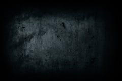 Dark scary background. Dark black concrete wall abandoned house with imperfections cement texture scary halloween background