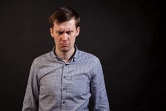 A dark haired white man with distrust expression face royalty free stock image A dark haired white man with distrust expression face royalty free stock image