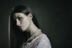 Dark portrait of pale woman stock photo Dark portrait of pale woman stock photo