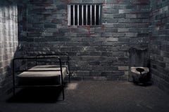 Dark prison cell at night