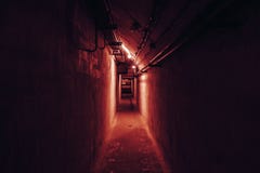 Dark underground illuminated tunnel or corridor with red light royalty free stock photos Dark underground illuminated tunnel or corridor with red light royalty free stock photos