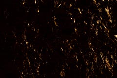 Dark yellow and black abstract background, golden shining metallic surface, crumpled gold metal shiny backdrop design stock images Dark yellow and black abstract background, golden shining metallic surface, crumpled gold metal shiny backdrop design stock images