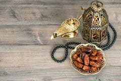 Dates, arabian lantern and rosary. Eid Mubarak stock photos Dates, arabian lantern and rosary. Eid Mubarak stock photos