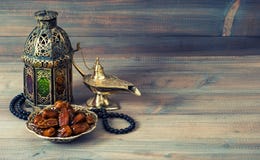 Dates, arabian lantern and rosary. Islamic holiday royalty free stock photo Dates, arabian lantern and rosary. Islamic holiday royalty free stock photo