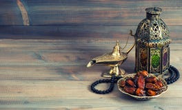 Dates, arabian lantern and rosary. Islamic holiday stock image Dates, arabian lantern and rosary. Islamic holiday stock image