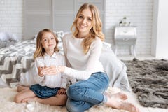 Daughter Having Painted A Smiley Face On Her Mothers Hand Stock Images Daughter Having Painted A Smiley Face On Her Mothers Hand Stock Images