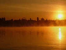 Dawn on the water. Mist over the water. Nature stock photos Dawn on the water. Mist over the water. Nature stock photos