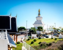 Day view of Butterfly Park and The Buddhist Stupa in Benalmadena town. Andalusia, southern Spain royalty free stock image Day view of Butterfly Park and The Buddhist Stupa in Benalmadena town. Andalusia, southern Spain royalty free stock image