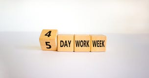 4 or 5 day work week symbol. Turned the cube and changed words `5 day work week` to `4 day work week`. Beautiful white backgro