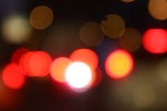 De aanstekende rode abstracte veelkleurige lichten bokeh van de achtergrond zwarte luxenacht, het lichte kleurrijke onduidelijke stock foto De aanstekende rode abstracte veelkleurige lichten bokeh van de achtergrond zwarte luxenacht, het lichte kleurrijke onduidelijke stock foto
