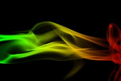 de achtergrondrookkrommen en golfreggae kleuren groen, geel, rood gekleurd in vlag van reggaemuziek stock foto de achtergrondrookkrommen en golfreggae kleuren groen, geel, rood gekleurd in vlag van reggaemuziek stock foto