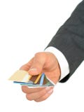 De Creditcards van de Holding van de Hand van de zakenman stock foto De Creditcards van de Holding van de Hand van de zakenman stock foto