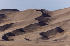 De duinen van het zand royalty-vrije stock afbeelding De duinen van het zand royalty-vrije stock afbeelding