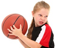 De ernstige Speler die van het Basketbal van het Kind van het Meisje Bal werpt royalty-vrije stock foto's De ernstige Speler die van het Basketbal van het Kind van het Meisje Bal werpt royalty-vrije stock foto's