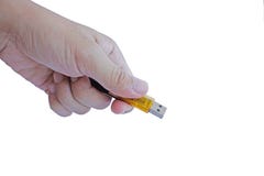 De flitsaandrijving van USB van de handholding royalty-vrije stock afbeelding De flitsaandrijving van USB van de handholding royalty-vrije stock afbeelding
