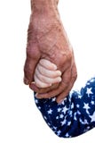 De hand van een oude mens en de hand van een klein meisje op een wit isoleerden achtergrond Eenheid van generaties Oude dag en de royalty-vrije stock fotografie De hand van een oude mens en de hand van een klein meisje op een wit isoleerden achtergrond Eenheid van generaties Oude dag en de royalty-vrije stock fotografie