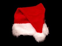 De Hoed van de Kerstman van Kerstmis op Zwarte royalty-vrije stock afbeelding De Hoed van de Kerstman van Kerstmis op Zwarte royalty-vrije stock afbeelding