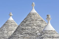 De huizen van Trulli in Alberobello, Puglia, Italië stock afbeelding De huizen van Trulli in Alberobello, Puglia, Italië stock afbeelding
