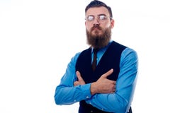 De knappe mens met een baard kleedde zich in een blauw overhemd royalty-vrije stock foto De knappe mens met een baard kleedde zich in een blauw overhemd royalty-vrije stock foto