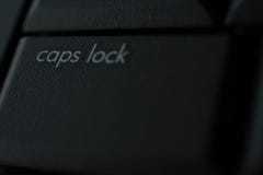 De knoop van het kappenslot op keybord stock fotografie De knoop van het kappenslot op keybord stock fotografie