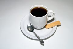 De Koffie van het ontbijt en een Wafeltje van de Suiker royalty-vrije stock foto's De Koffie van het ontbijt en een Wafeltje van de Suiker royalty-vrije stock foto's