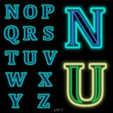 De lichtgevende Vectordoopvont van het neonalfabet De kleur van licht wordt gemakkelijk veranderd Neonbrieven op een donkerblauwe stock illustratie De lichtgevende Vectordoopvont van het neonalfabet De kleur van licht wordt gemakkelijk veranderd Neonbrieven op een donkerblauwe stock illustratie