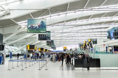 De Luchthavencontrole van Heathrow in bureaus Stock Afbeelding De Luchthavencontrole van Heathrow in bureaus Stock Afbeelding