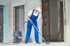 de schoonmakende dienst stofverwijdering met stofzuiger royalty-vrije stock afbeelding de schoonmakende dienst stofverwijdering met stofzuiger royalty-vrije stock afbeelding