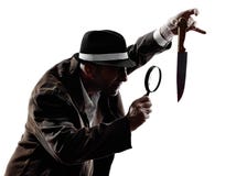 De silhouetten van de misdadigersonderzoeken van de detectivemens stock foto De silhouetten van de misdadigersonderzoeken van de detectivemens stock foto