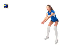 De speler van het vrouwenvolleyball ver met bal stock afbeelding De speler van het vrouwenvolleyball ver met bal stock afbeelding