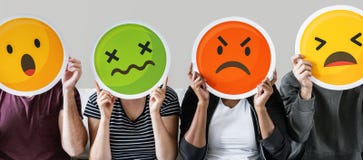 De uitdrukkingsemojis van de arbeidersholding op laag stock afbeelding De uitdrukkingsemojis van de arbeidersholding op laag stock afbeelding