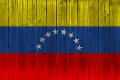 De vlag van Venezuela op oude houten plank wordt geschilderd die stock foto's De vlag van Venezuela op oude houten plank wordt geschilderd die stock foto's