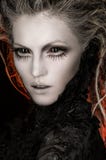 De vrouw van de blonde met creatieve make-up stock fotografie De vrouw van de blonde met creatieve make-up stock fotografie