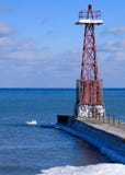 De vuurtoren en een bevroren Meer Michigan van Chicago stock foto De vuurtoren en een bevroren Meer Michigan van Chicago stock foto