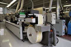 De winkel van af:drukken: De UV druk van de flexopers stock foto De winkel van af:drukken: De UV druk van de flexopers stock foto