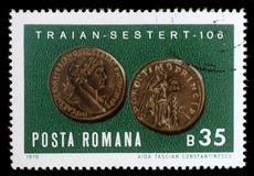 De zegel die door Roemenië wordt gedrukt, toont het kopersestertius van Keizertrajans stock fotografie De zegel die door Roemenië wordt gedrukt, toont het kopersestertius van Keizertrajans stock fotografie