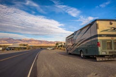 Luxury RV parked at the Stovepipe Wells way-station in Death Valley royalty free stock photo Luxury RV parked at the Stovepipe Wells way-station in Death Valley royalty free stock photo
