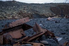 Debris on the black beach in Iceland stock photo Debris on the black beach in Iceland stock photo