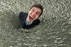 Debtor with money is falling in black hole. Bankruptcy concept Stock Images Debtor with money is falling in black hole. Bankruptcy concept Stock Images