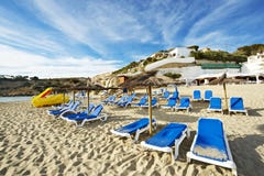 Deckchair And Sunshade On A Beach Of Ibiza Royalty Free Stock Images