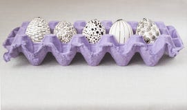 Decorating Easter eggs using a wax-resist method stock image Decorating Easter eggs using a wax-resist method stock image